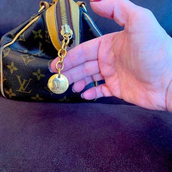 Authentic Louis Vuitton Tivoli with dust bag. - Picture 10 of 12